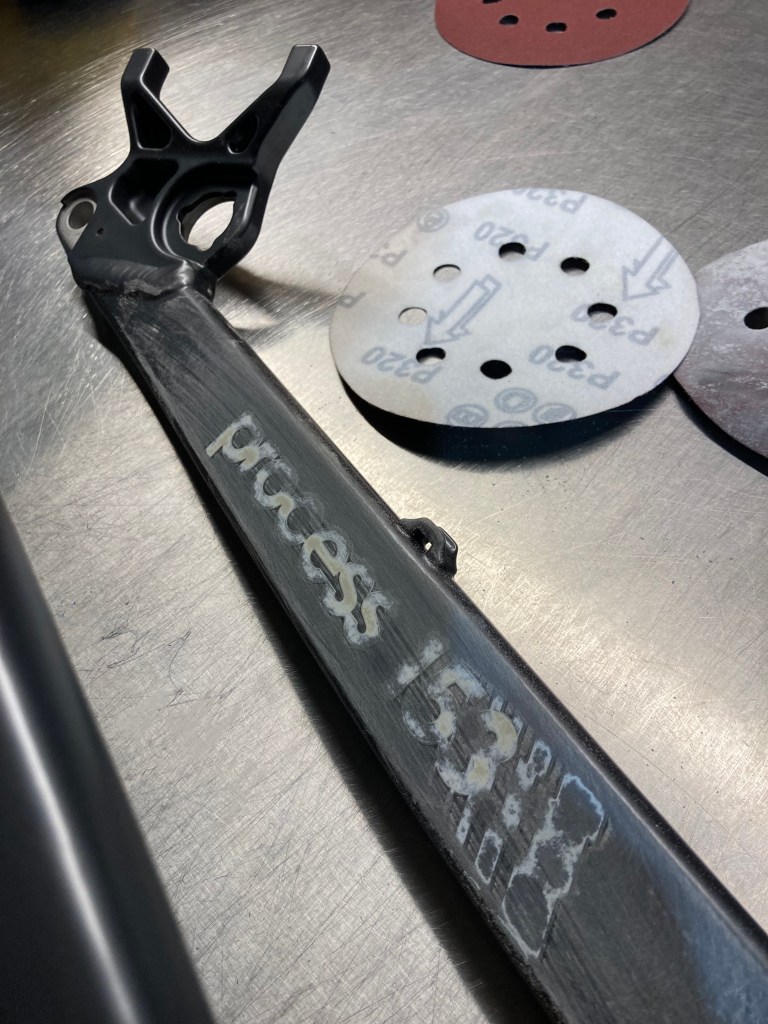 Sanding back to remove as much paint as possible 